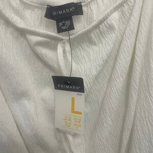 This is a Primark white cheesecloth top.